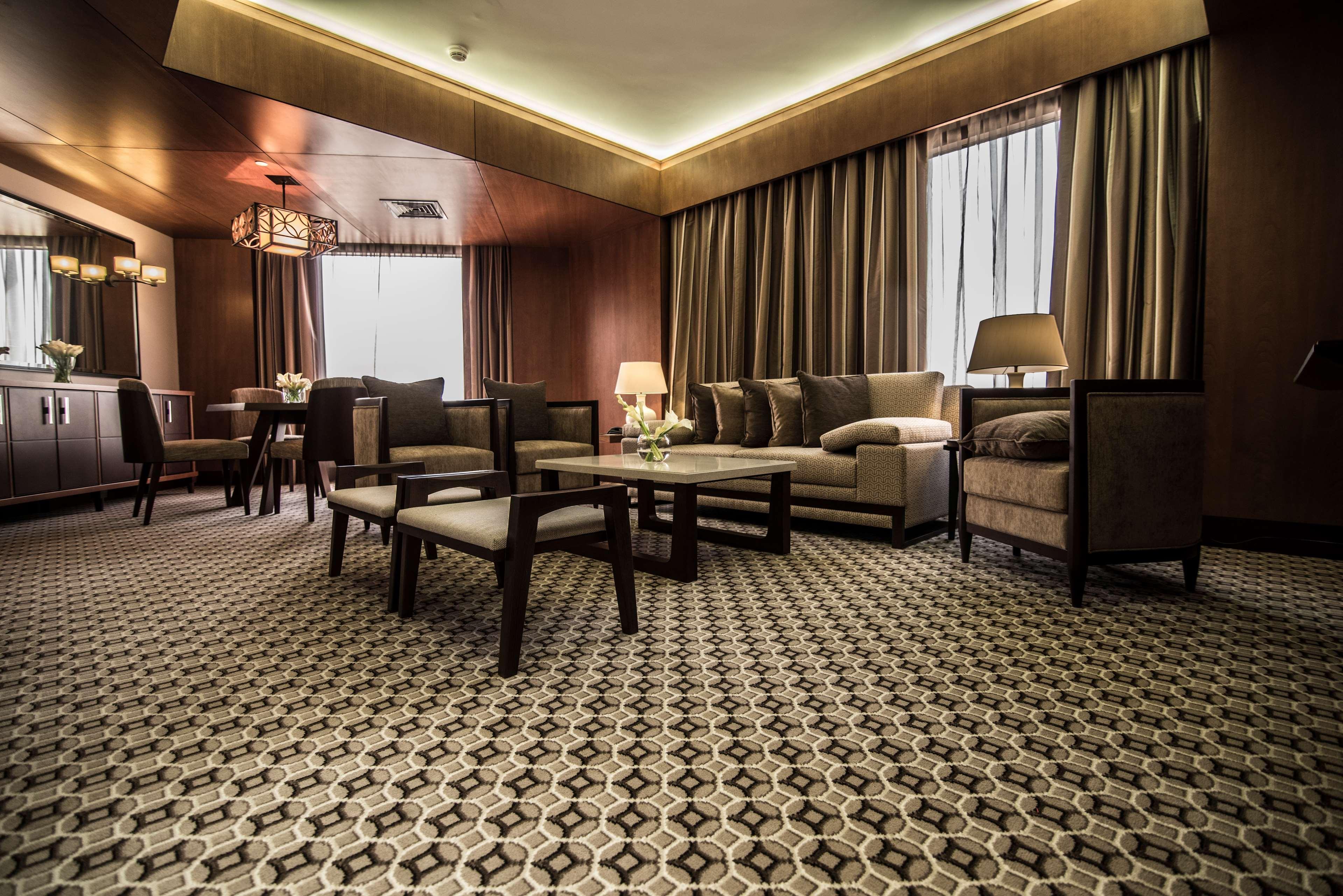 Ayla Grand Hotel Al Ain Exterior foto A carpet in a hotel