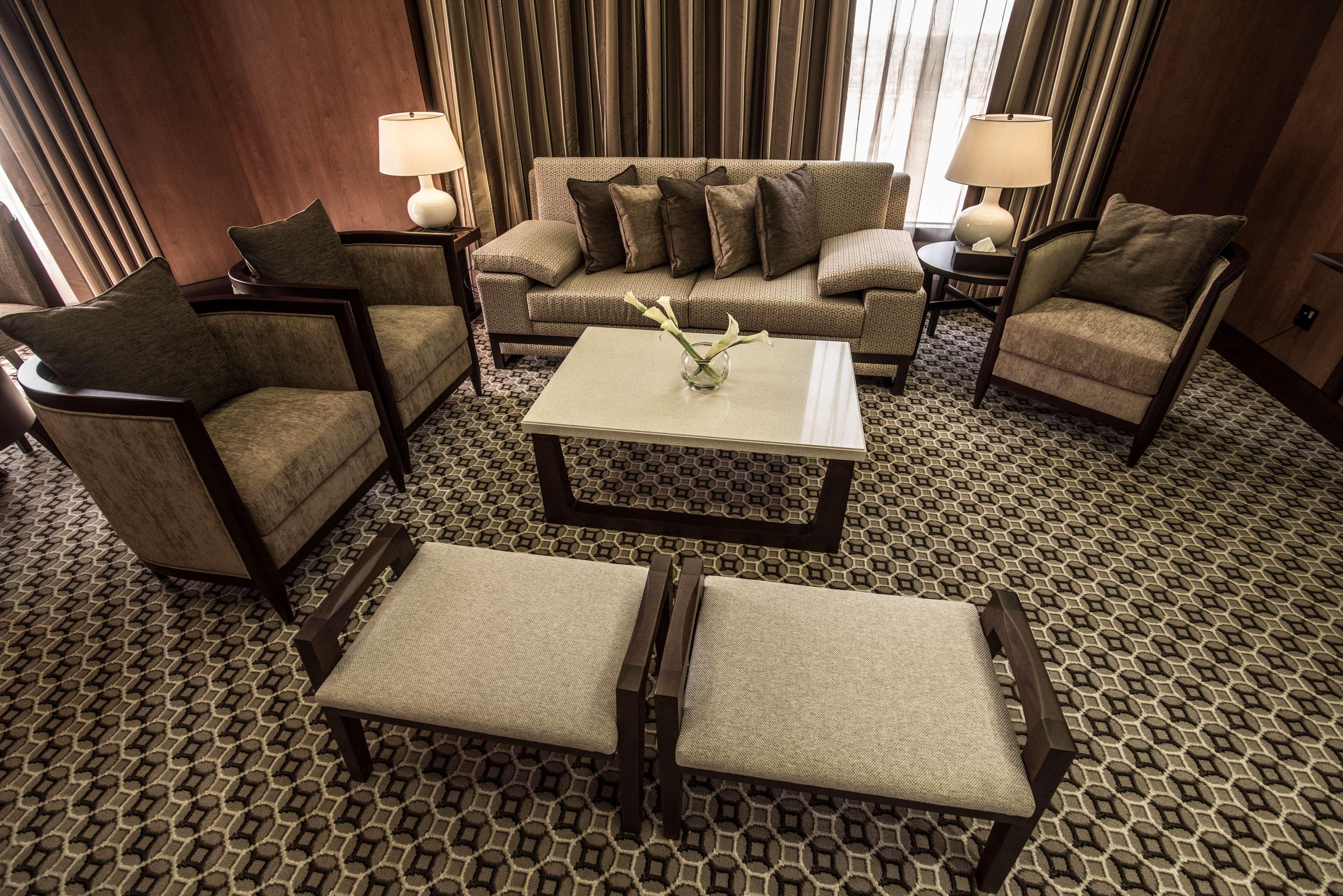 Ayla Grand Hotel Al Ain Exterior foto A 3D rendering of a living room